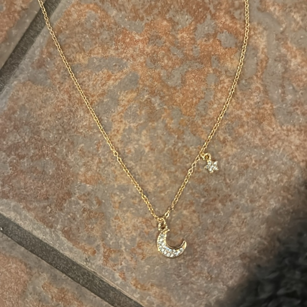 Brand new star and moon necklace